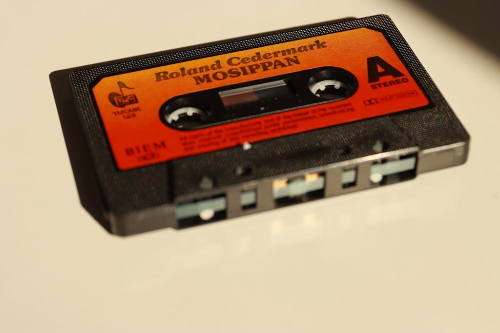 Close-up of a vintage cassette tape titled 'Mosippan' by Roland Cedermark, with a retro design.